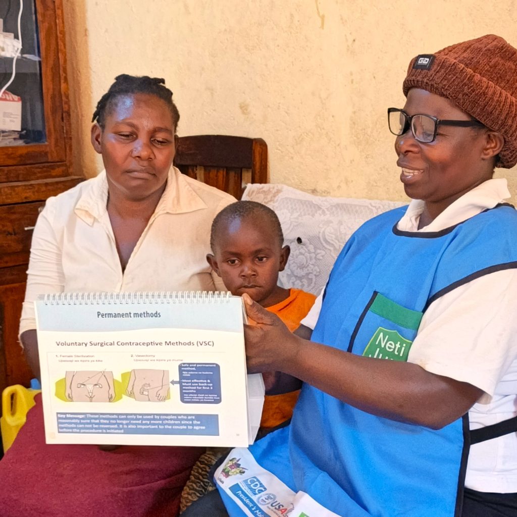 Elizabeth Mideva, a Community Health Promoter in Vihiga, Kenya with a client. She has helped transform lives through family planning.