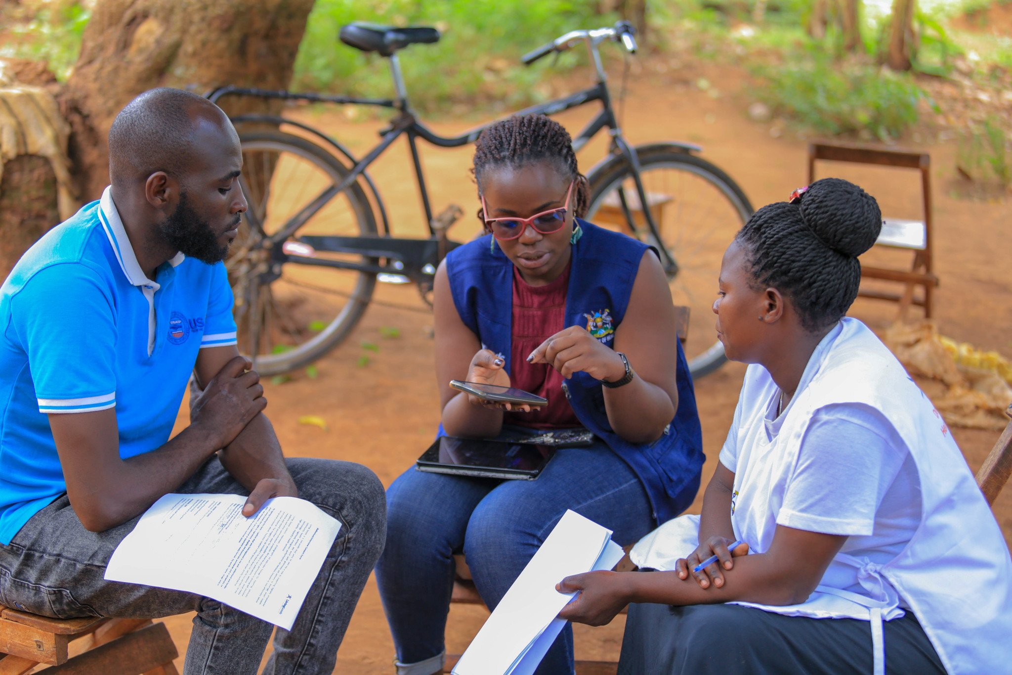 Nyende Abdul Aziz (CHEW) with Wotali Irene a Village Health Team (VHT) and LG CHS Clare Ojambo.