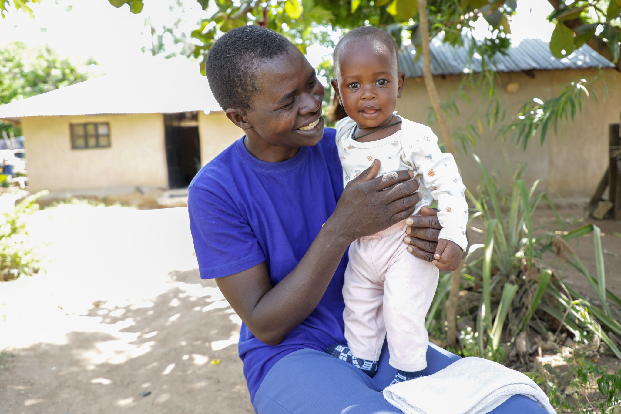 Florence Atieno Anyango with her son James Michael - Household members/Client,Seme Sub-County, Kisumu County