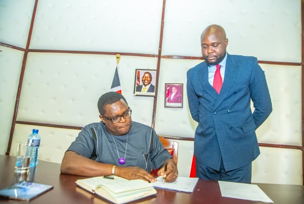 Governor Kenneth Lusaka signing the partnership